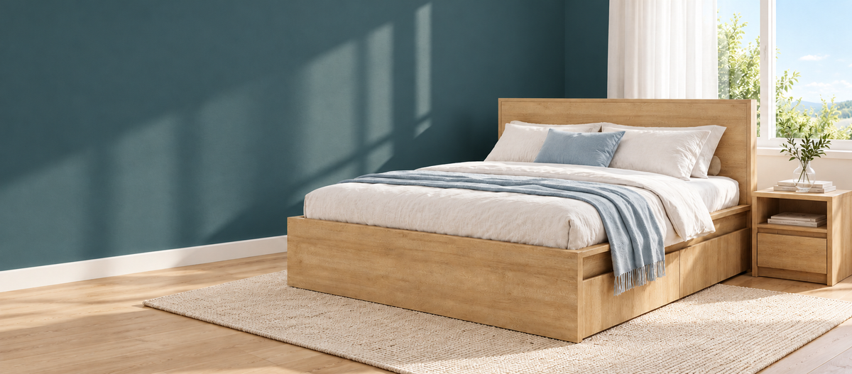 Harris oak storage bed styled with blue and white bedding in a bright summer bedroom